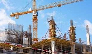 Operational crane at a large-scale construction site